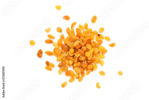 Golden dried raisins  isolated on white background