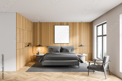 White and wooden bedroom with poster © ImageFlow
