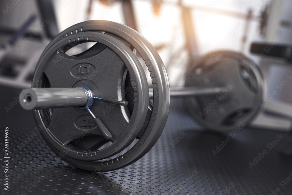 Barbell on the floor of gym. Close up fItness equipment. Barbell on the floor of gym. Close up fItness equipment.
