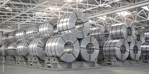 Rolls of metal sheet. Zinc, aluminium or steel sheet rolls on warehouse in factory. © Maksym Yemelyanov
