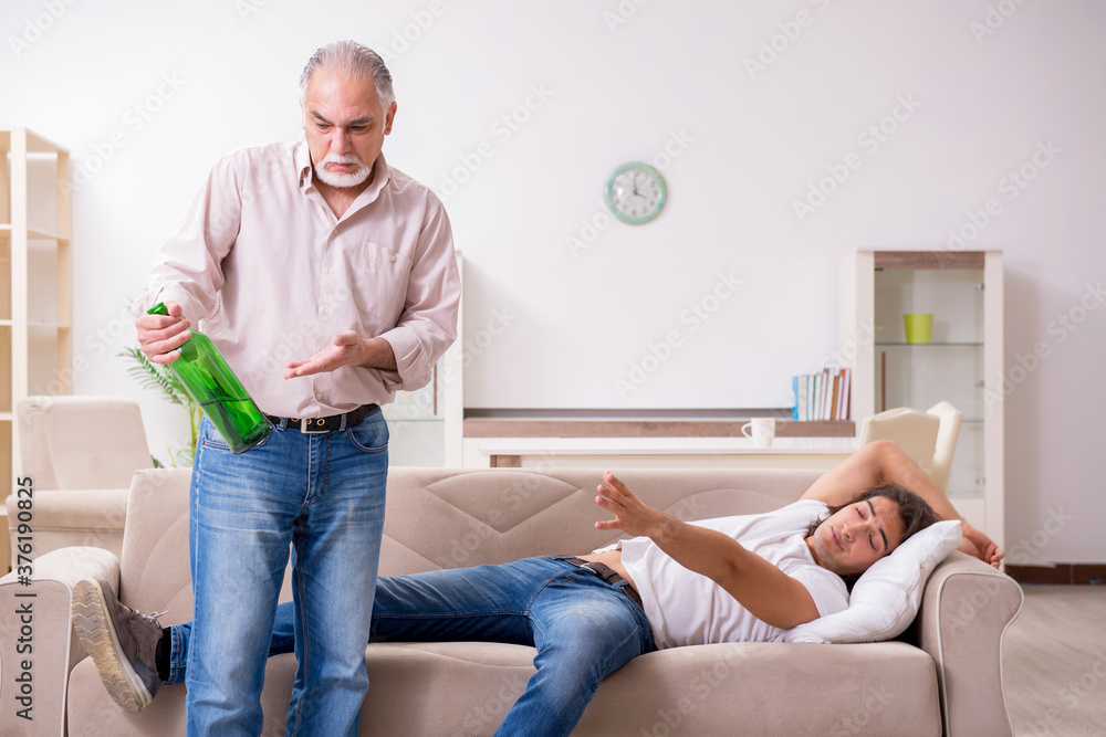 Fototapeta premium Man with drinking problem and the family
