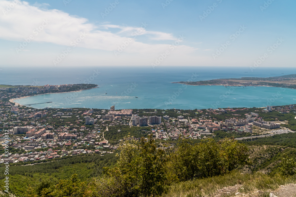 View of Gelendzhik Bay from the height of the Markhotsky ridge in summer.