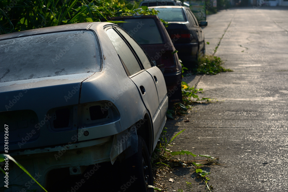 Chiang Mai, Thailand - September 5, 2020. Dirty and wreck cars at the car cemetery. Chiang Mai, Thailand - September 5, 2020. Dirty and wreck cars at the car cemetery.