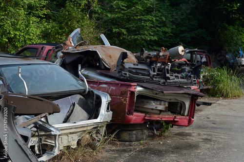 Chiang Mai, Thailand - September 5, 2020. Dirty and wreck cars at the car cemetery.