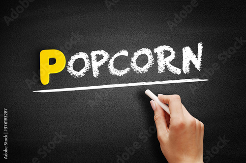 Popcorn text on blackboard, concept background
