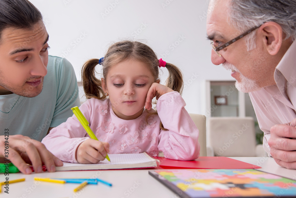 Three generations of family in early development concept Three generations of family in early development concept