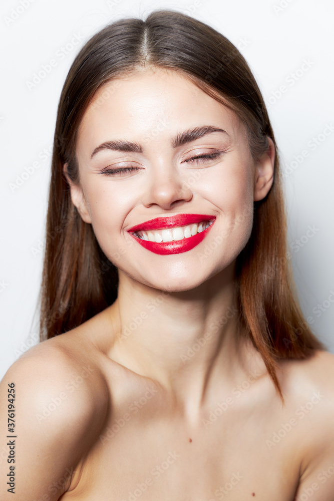 Obraz premium Woman bare shoulders Smile red lips closed eyes 