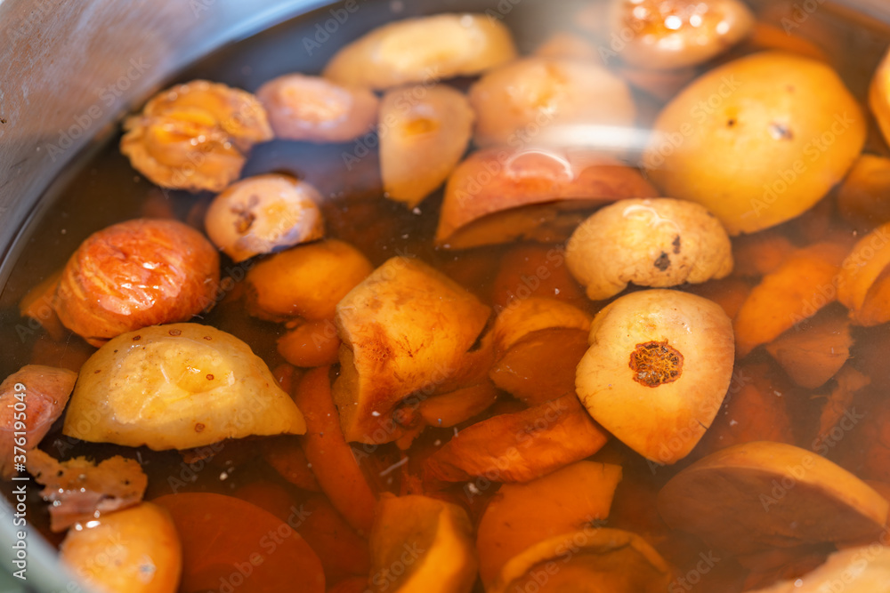 Stewed apples, peaches and plums are cooked in a pan Stewed apples, peaches and plums are cooked in a pan