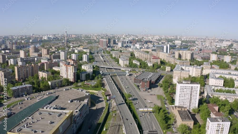 Aerial top view of road junction in Moscow from above, automobile traffic and Andropov Avenue in the Yuzhnyy Port district of Moscow near the automobile ring highway. Aerial top view of road junction in Moscow from above, automobile traffic and Andropov Avenue in the Yuzhnyy Port district of Moscow near the automobile ring highway.
