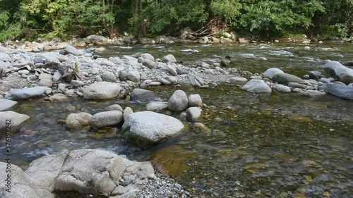 Water flowing between the rocks of a river