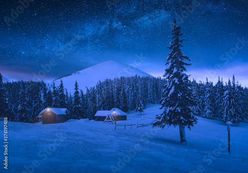 Mountain village in high mountain valley under the starry sky
