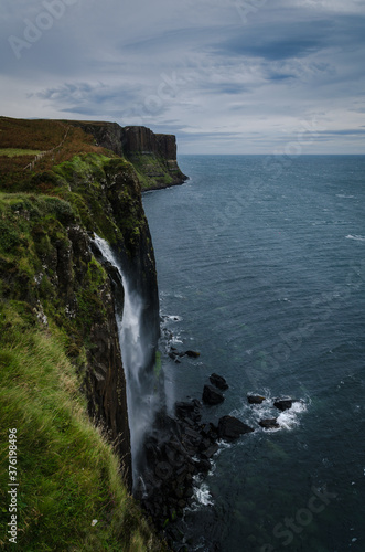 Kilt Rock and waterfall in Scottish highlands on the Isle of Skye, Scotland, United Kingdom