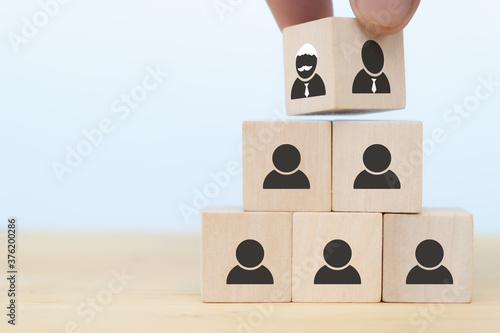 Quadro em tela business hand man put arranging on wooden cube block that family or company Succession business concept from old generation to next generation