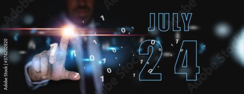 july 24th. Day 24 of month,advertising or high-tech calendar, man in suit presses bright virtual button summer month, day of the year concept
