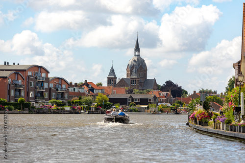 Photos A sloop sails over the old Rijn near the South-Holland village of Leiderdorp in the Netherlands