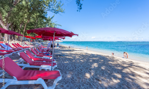 beach chairs and umbrellas, l’Hermitage, Saint-Gilles-les-Bains, Reunion Island 