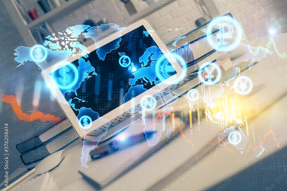 Fototapeta premium Financial market graph hologram and personal computer on background. Multi exposure. Concept of forex.