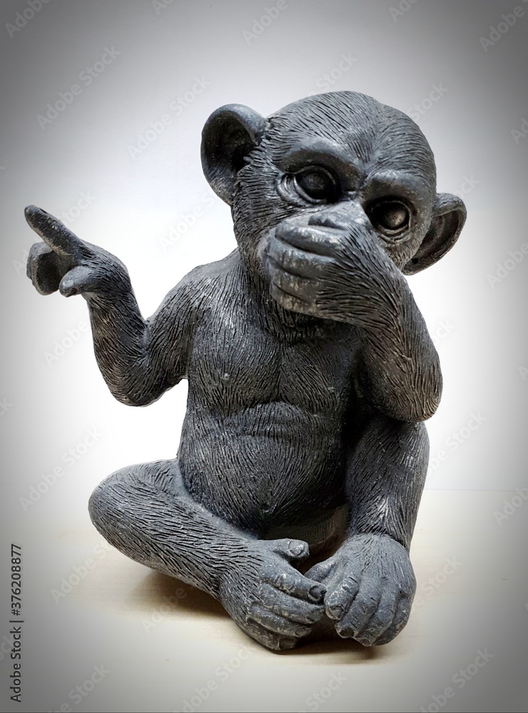 wooden statue of a lion
a monkey wooden statue of a lion
a monkey