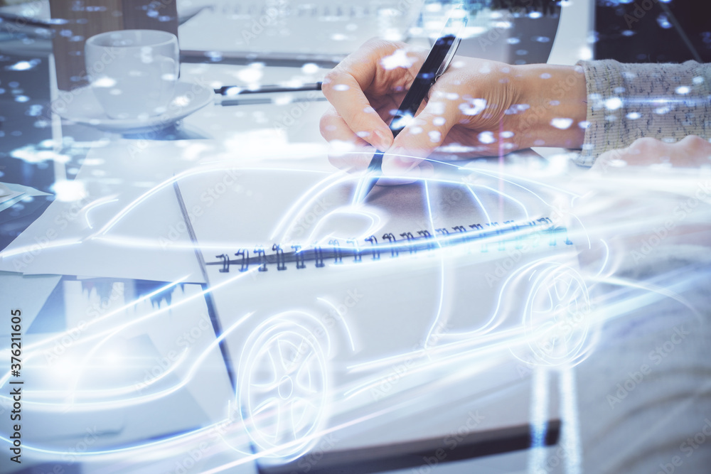 Tech autopilot theme hologram over woman's hands taking notes background. Concept of hightech. Double exposure Tech autopilot theme hologram over woman's hands taking notes background. Concept of hightech. Double exposure