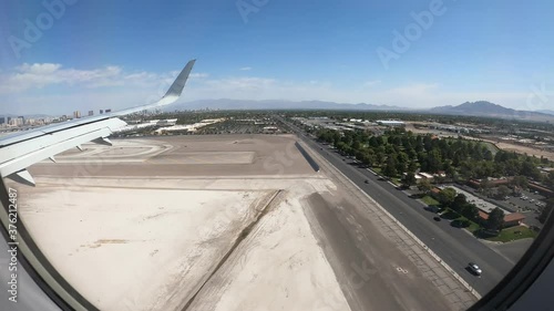 View from an airplane window on arrival to an airport