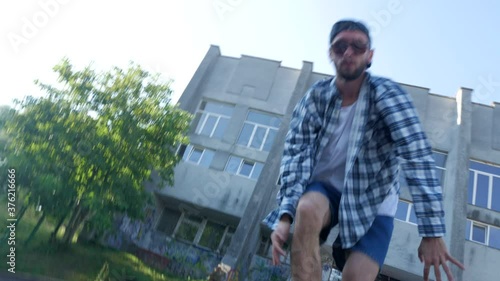 Wallpaper Mural He dances funny. The guy coolly dances hip-hop on the background of the house. Professional dancer dances House dance and Popping. Torontodigital.ca