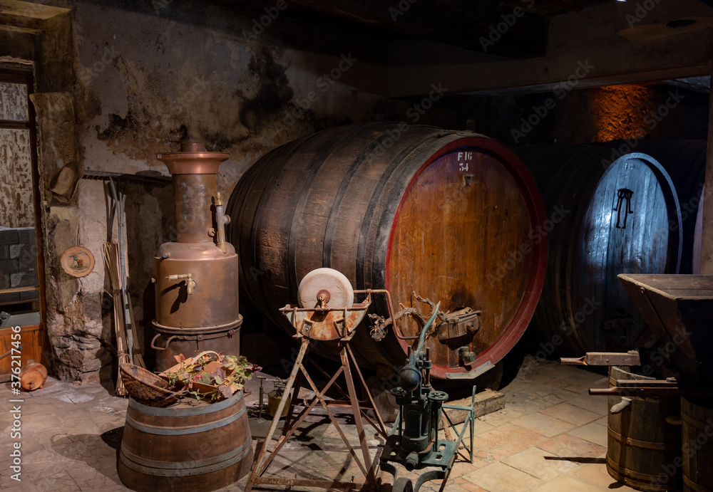 Old wine casks on wine domain in Cotes de Provence near Collobrieres , region Provence, south of France Old wine casks on wine domain in Cotes de Provence near Collobrieres , region Provence, south of France