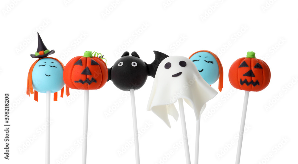 Obraz premium Different Halloween themed cake pops on white background