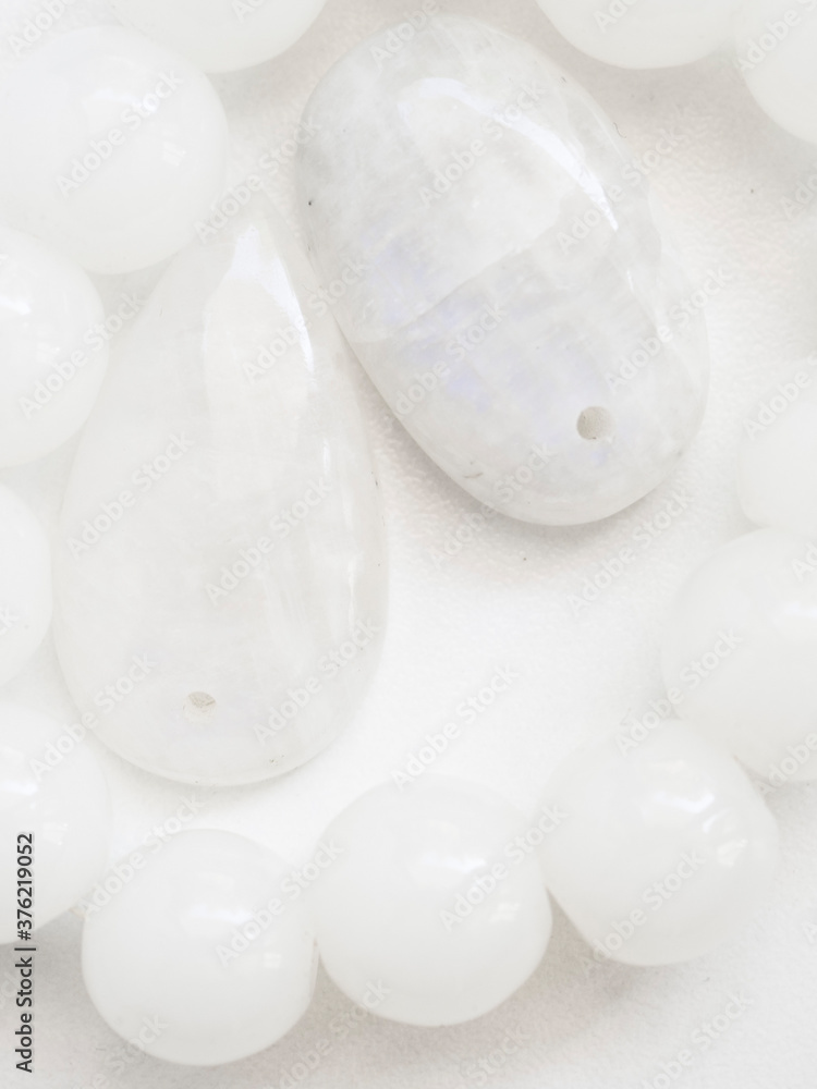 Natural moonstones on white background Natural moonstones on white background