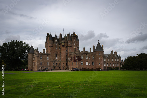 Glamis Castle in the scottish countryside on a cloudy day, Scotland, United Kingdom