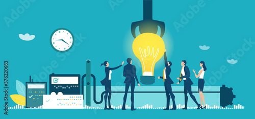 Factory with business people and workers and conveyor belt line with robots hands manufacturing light bulbs and great new ideas. Factory automation production, manufacturing concept