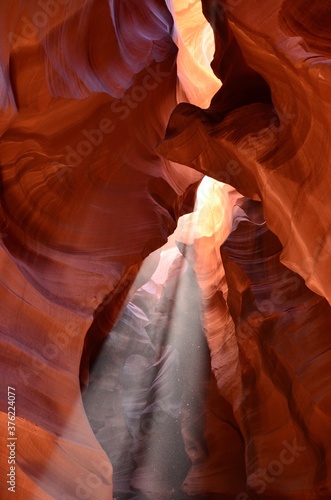 Upper Antelope Canyon near the town of Page in Arizona, a sunlight beam in the middle, prime time, noonday 