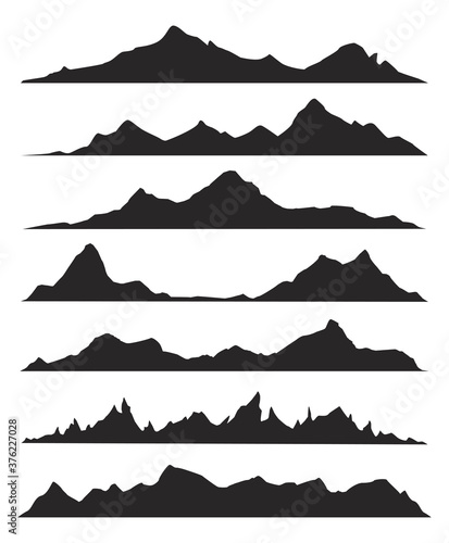 Mountains silhouettes on the white background. Vector set of outdoor design elements.
