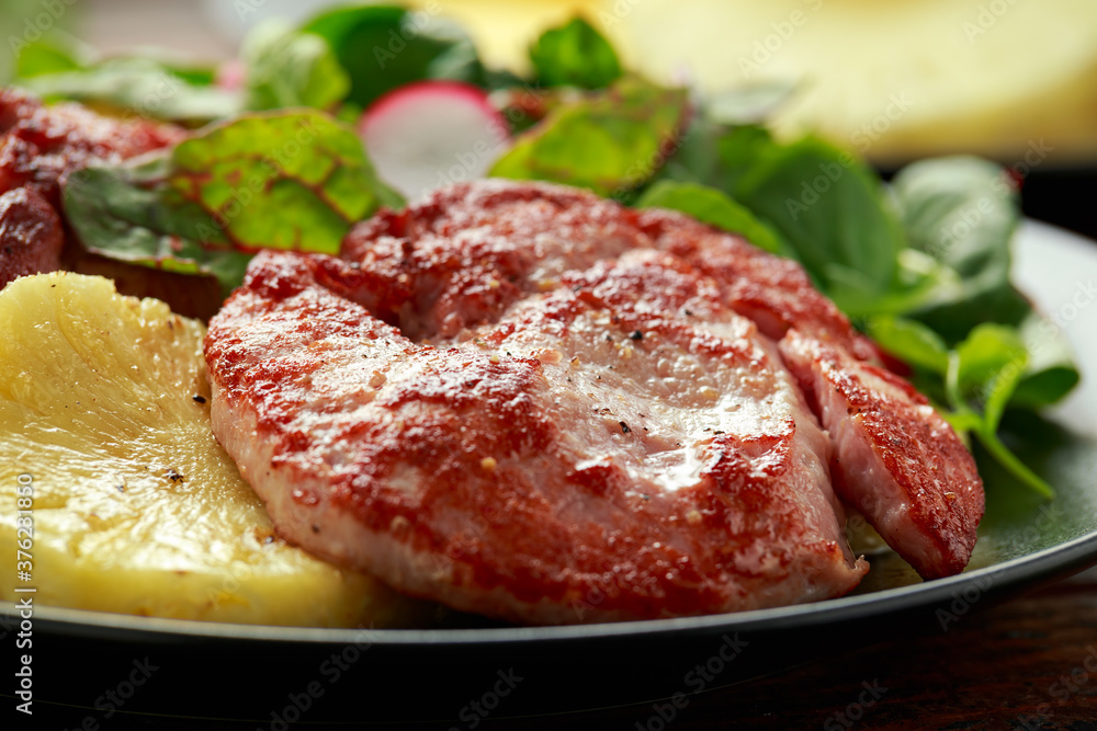 Fried Gammon steak with pineapple, french fries and vegetables Fried Gammon steak with pineapple, french fries and vegetables