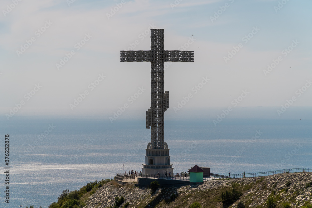 High 43-meter Orthodox cross on the Markhotsky ridge with a view of The Gelendzhik Bay.