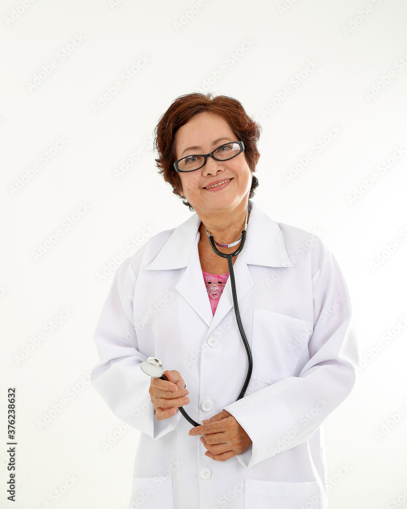 Elderly asian Chinese female doctor on white background wearing white apron stethoscope look at camera Elderly asian Chinese female doctor on white background wearing white apron stethoscope look at camera