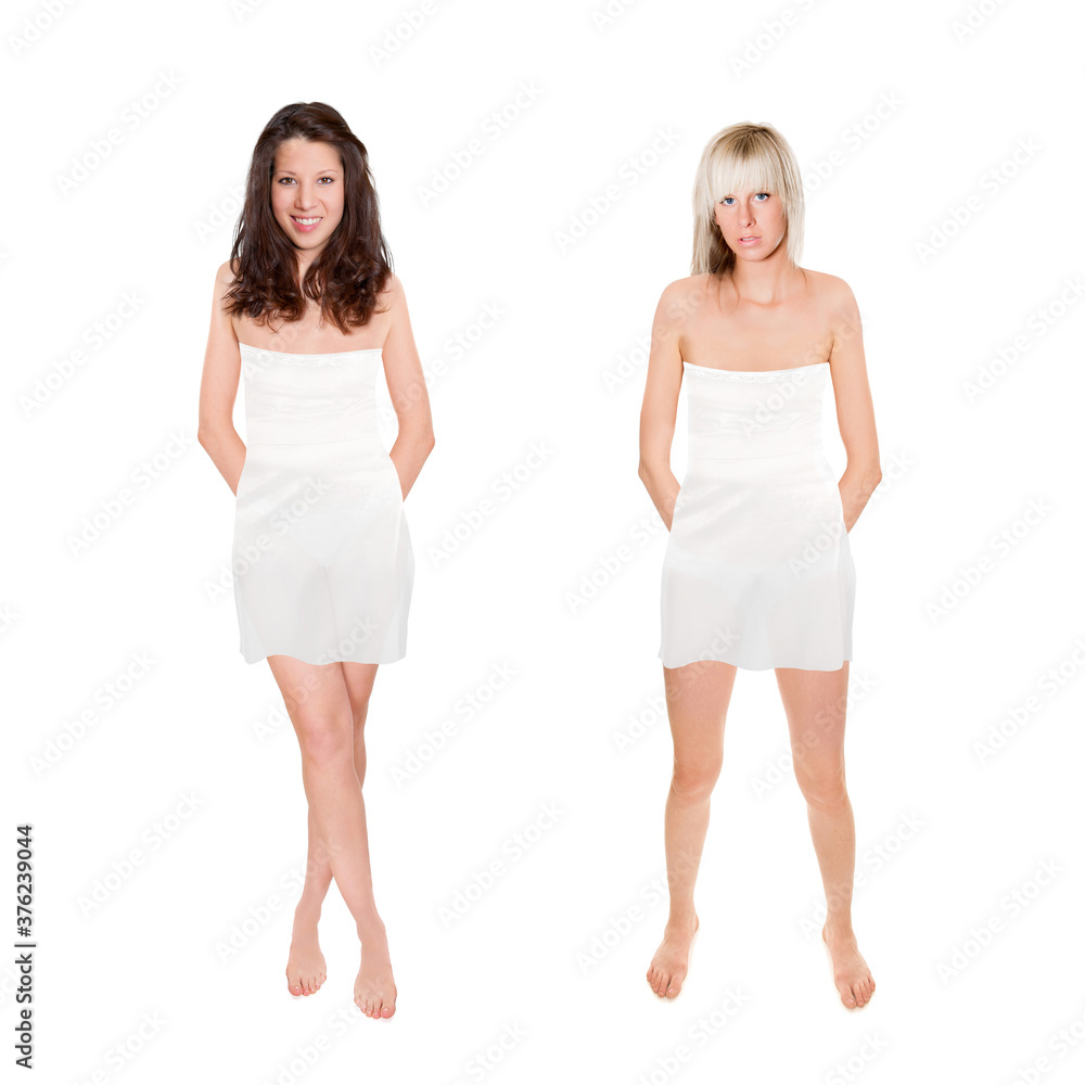 Full length portraits of two attractive young women wearing short summer dresses, isolated in front of white background
Full length portraits of two attractive young women wearing short summer dresses, isolated in front of white background