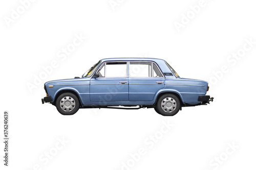 Compact blue sedan car VAZ-2101 "Zhiguli" is isolated on white background. © Dmytro