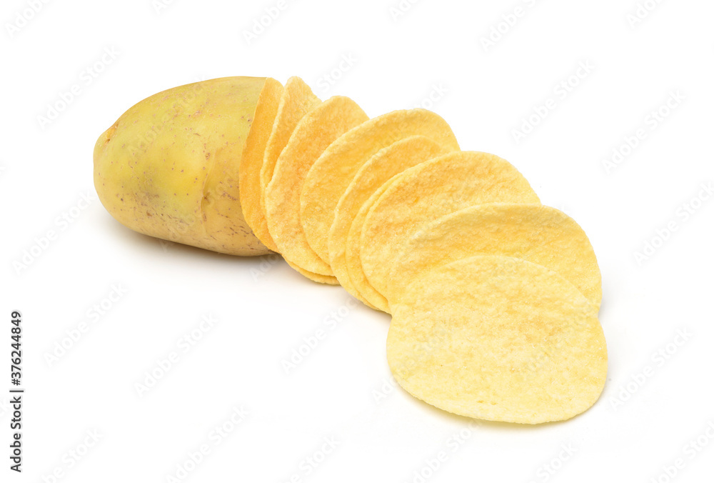 Crispy potato chips snack flat cut with fresh potato cut in half isolated on white background. Crispy potato chips snack flat cut with fresh potato cut in half isolated on white background.