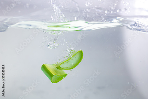 Several pieces of aloe have fallen into the water.