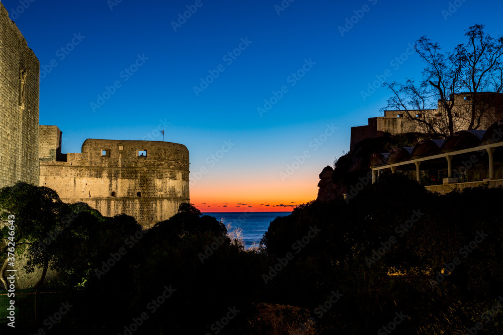 Fortress from outside, long exposure photograph at blue hour. Scenery winter view of Mediterranean old city of Dubrovnik, famous European travel and historic destination, Croatia