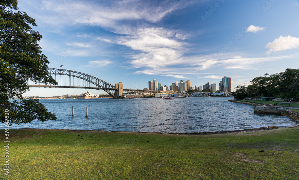 Naklejka premium Panoramic view of Sydney harbor bridge with Sydney downtown skyline, in the afternoon, New South Wales, Australia