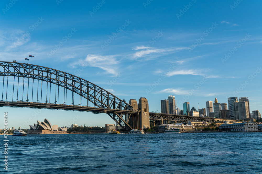Sydney harbor bridge with Sydney downtown skyline, in the afternoon, New South Wales, Australia