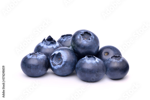 Pile of Juicy Blueberries fruits isolated on white background
