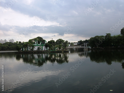 Mosque on the opposite side of the lake at Dhakuria Lake, Kolkata, India. 