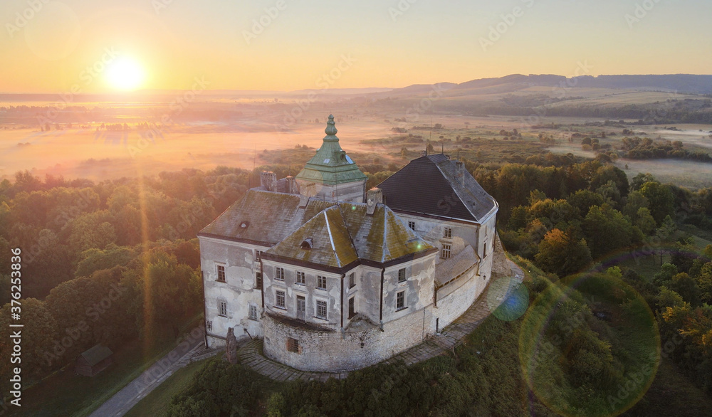 Fototapeta premium Amazing medieval castle on the sunset.