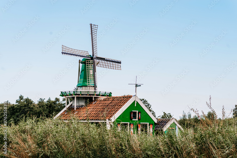 Traditional Dutch Green Mill In Zaanse Schans, The Netherlands