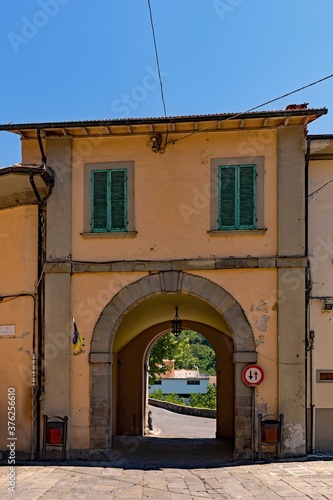 Gate of the old town of Castelnuovo di Garfagnana at the Tuscany Region in Italy  photo