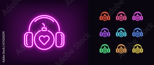Neon bomb icon. Glowing neon bomb with headphones and heart sign, explosive sound