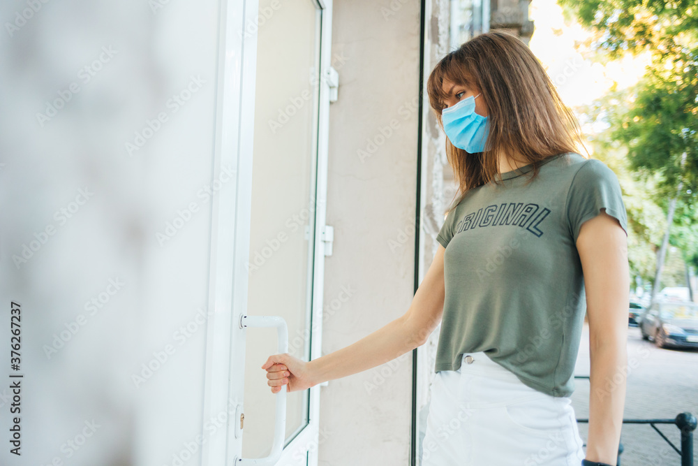 Young woman wearing protective medical mask Young woman wearing protective medical mask