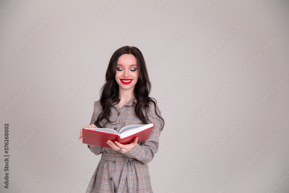 woman brings a book, open it page by page, isolated on white background woman brings a book, open it page by page, isolated on white background